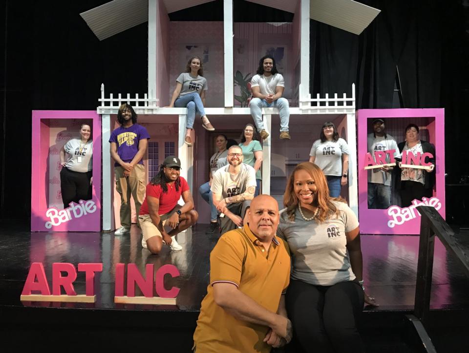 Jonathon and Nikki Romain purchased the former Greeley School in 2018 to open a community arts center. Some of the center's 75 full and part-time employees are pictured in the background.