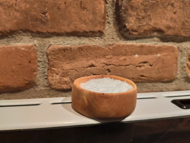 bowl of finishing salt on top of stove