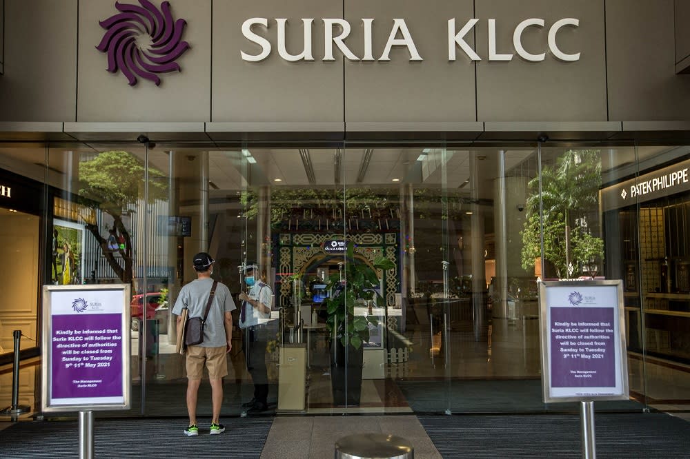 Police today confirmed that action has been taken against a white woman for refusing to wear a face mask and who failed to check in at the Suria KLCC shopping mall via the MySejahtera app. ― Picture by FIrdaus Latif