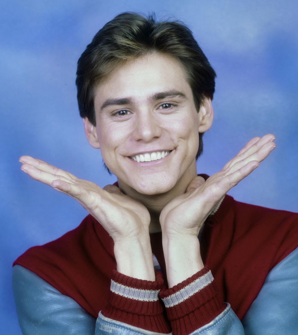 Jim Carrey smiles as he's photographed in 1985