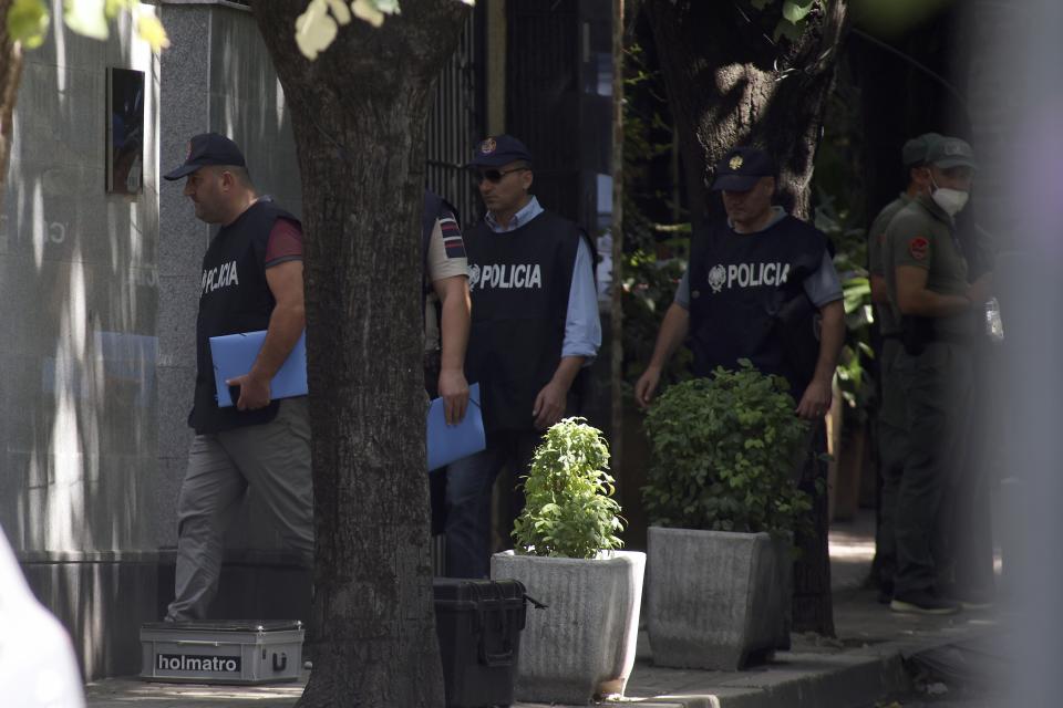 Police enter the Iranian Embassy in Tirana, Albania, Thursday, Sept. 8, 2022. The last staff of the Iranian Embassy in Tirana left the building Thursday after they were given 24 hours to leave Albania over a major cyberattack that the Albanian government blames on Iran. (AP Photo/Franc Zhurda)