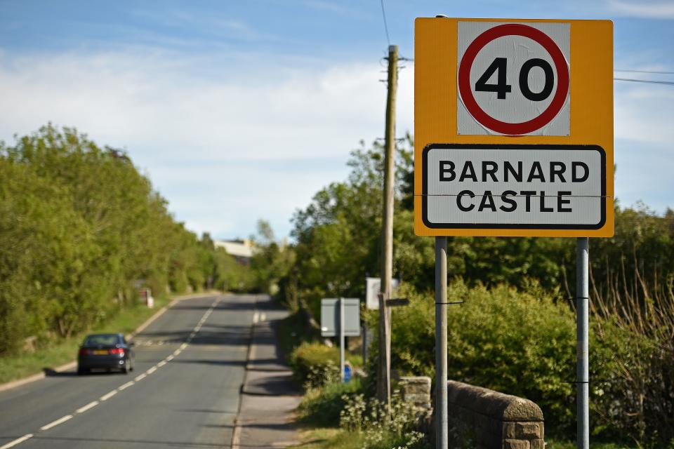 A road sign is pictured on the outskirts of Barnard Castle, less than 30 miles southwest of Durham, north east England, on May 25, 2020, a popular tourist village that Number 10 Downing Street special advisor Dominic Cummings acknowledged he visited during the COVID-19 lockdown. - British Prime Minister Boris Johnson's top adviser Domonic Cummings said Monday he acted "reasonably and legally" despite mounting pressure on him to resign for allegedly breaking coronavirus lockdown rules. "I don't think there is one rule for me and one rule for all people," Cummings told reporters in his first official press conference on the job. "In all circumstances, I believe I behaved reasonably and legally." (Photo by Oli SCARFF / AFP) (Photo by OLI SCARFF/AFP via Getty Images)