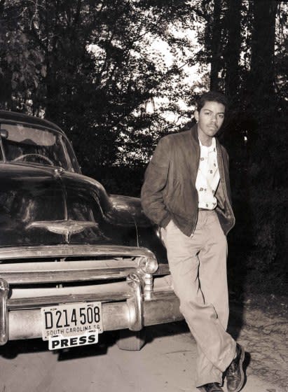 Cecil J. Williams, seen here in a photo from the mid-1950s when he was a young freelance photographer for "Jet" magazine, documented Jim Crow segregation and civil-rights demonstrations in his home state of South Carolina.
