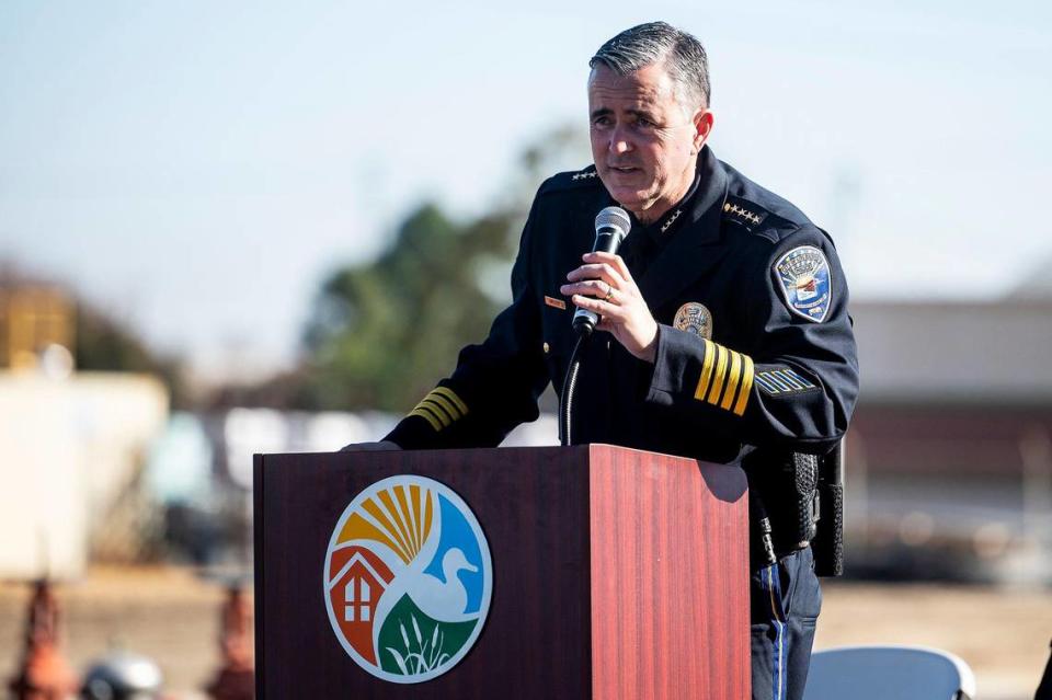 Outgoing Los Banos Police Chief Gary Brizzee speaks to the crowd during a grand opening ceremony and unveiling of the new Los Banos Police Department headquarters located at 1111 G Street in Los Banos, Calf., on Friday, Nov. 3, 2023. In a separate ceremony Friday afternoon, Ray Reyna was sworn in as the new Los Banos Police Chief.