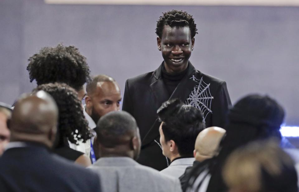 Oregon's Bol Bol smiles before the NBA basketball draft Thursday, June 20, 2019, in New York. (AP Photo/Julio Cortez)