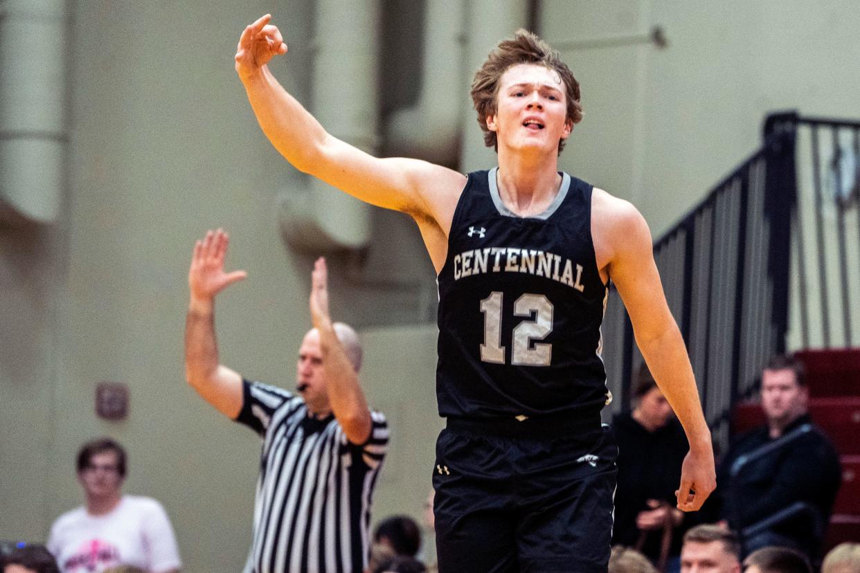 Ankeny Centennial's Joey Oakie reacts after making a 3-pointer during a basketball game at Ankeny High School on Feb. 2 in Ankeny.