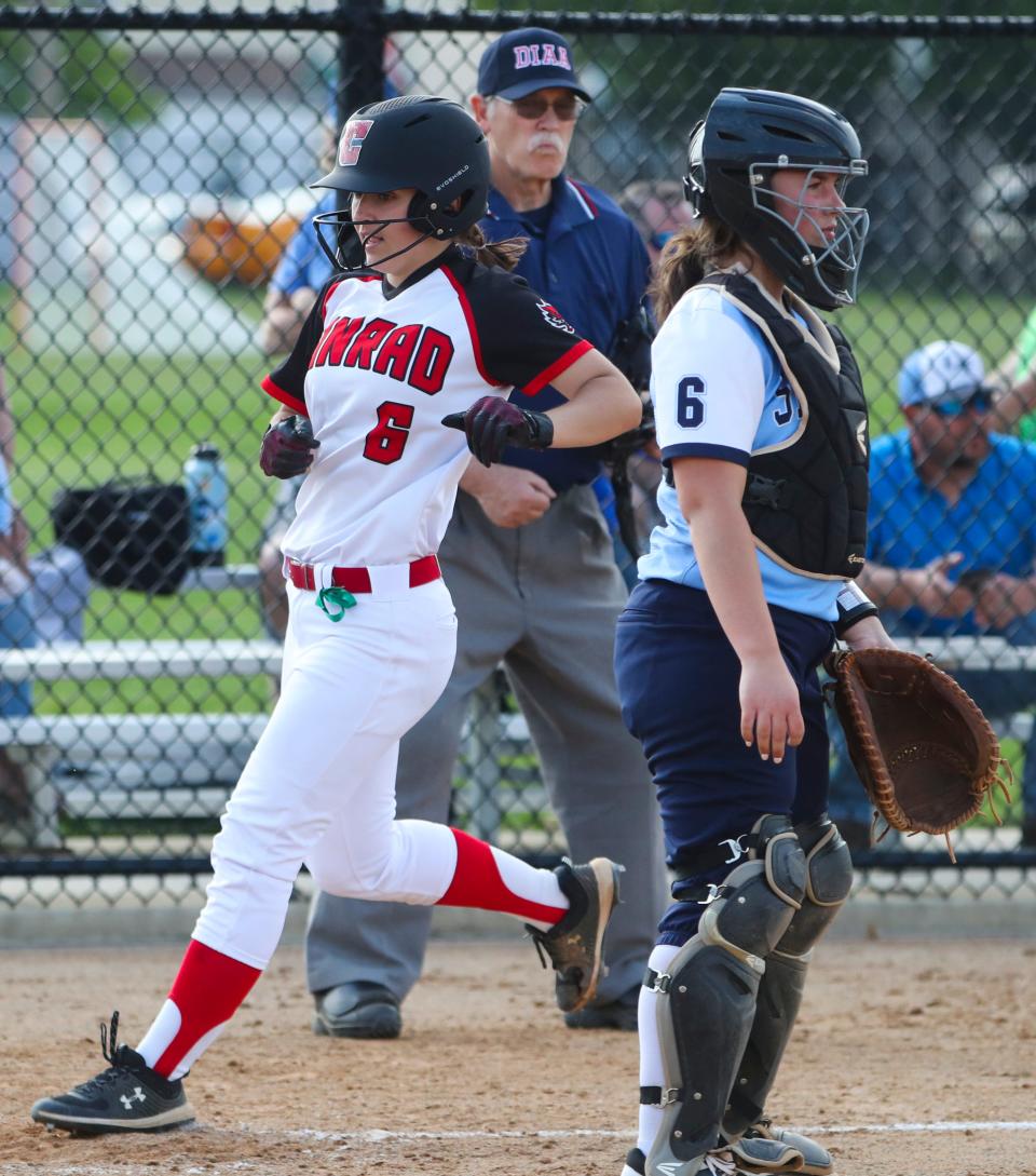 Conrad's Bella McKee (left) made the All-Diamond State Conference first team in softball.