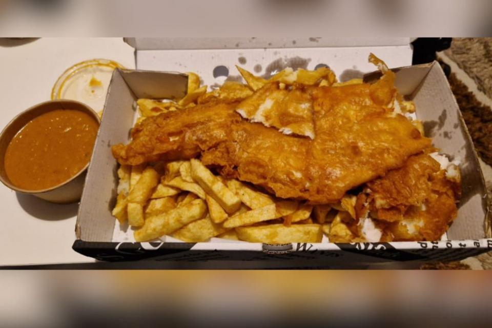 South Wales Argus: Fish and chips from Maindee fish bar including pot of curry sauce