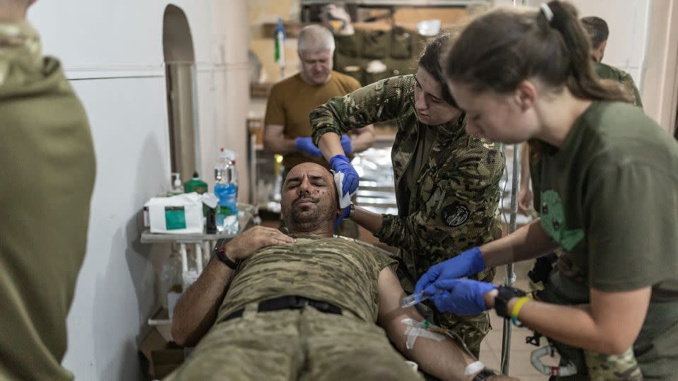 Ukrainian army medics treat wounded soldiers at a stabilization point in the direction of Pokrovsk. – Diego Herrera Carcedo/Anadolu/Getty Images