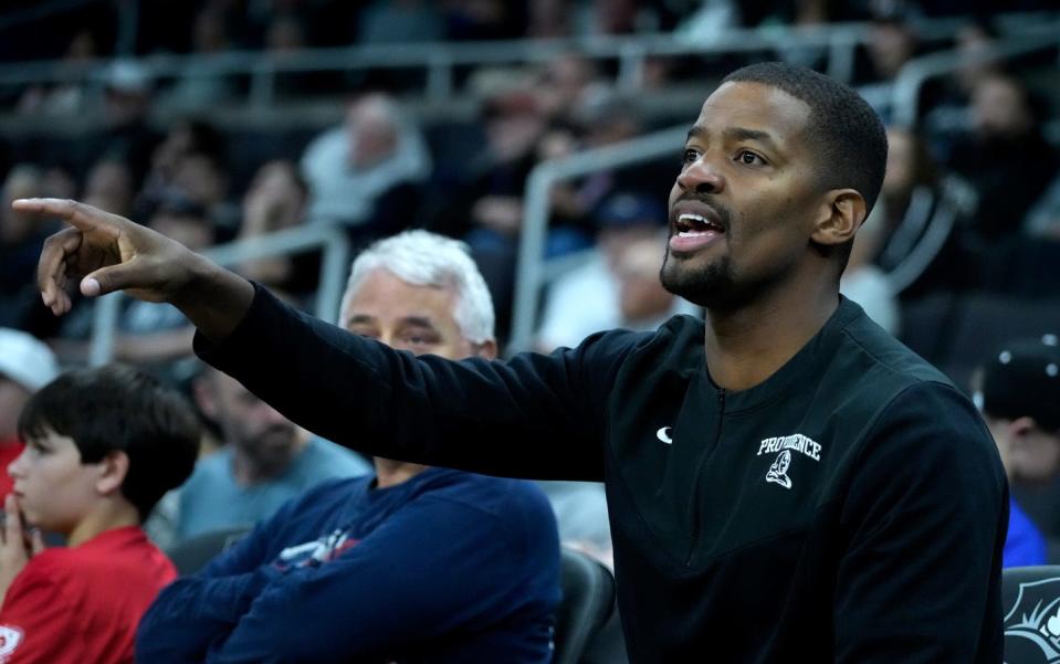 Providence College men's head basketball coach Kim English shouts instructions from the sideline during the Mal Brown Scrimmage on Saturday.