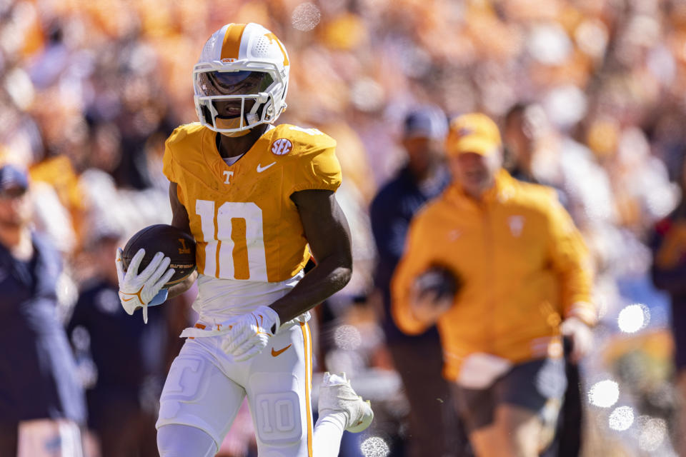 Tennessee wide receiver Squirrel White (10) runs for an 82-yard touchdown on a pass from Joe Milton III during the first half of an NCAA college football game against UConn, Saturday, Nov. 4, 2023, in Knoxville, Tenn. (AP Photo/Wade Payne)