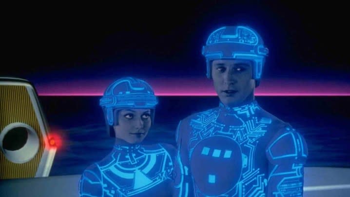 Lora Baines and Kevin Flynn in their digital suits in Tron.