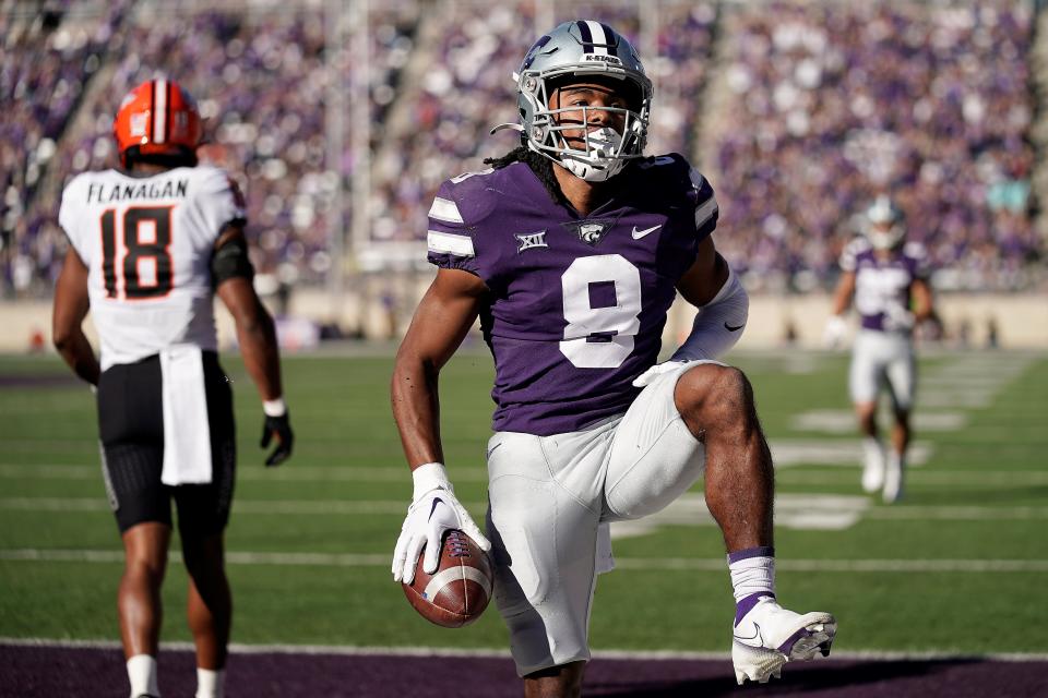 Kansas State receiver Phillip Brooks (8) celebrates after scoring a touchdown against Oklahoma State at Bill Snyder Family Stadium.