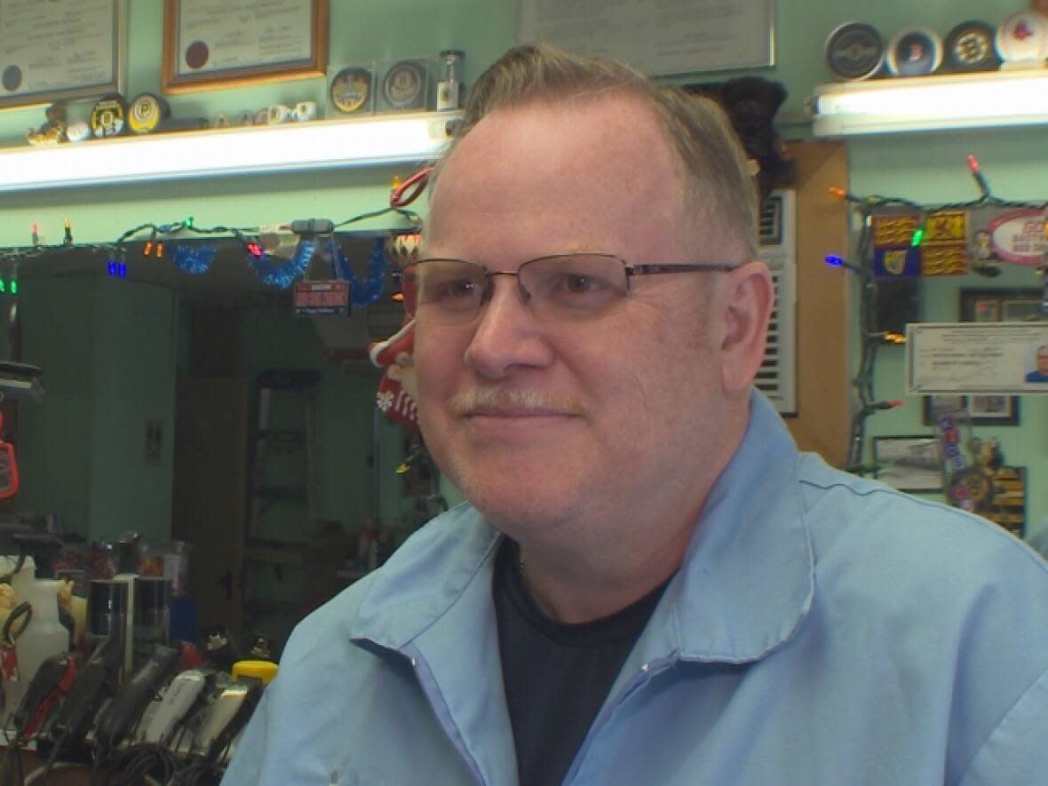 Blaine Harris, registrar of the New Brunswick Registered Barbers' Association, says he opposes the new restrictions on barbershops, but he wants members to follow the public health rules. (CBC - image credit)