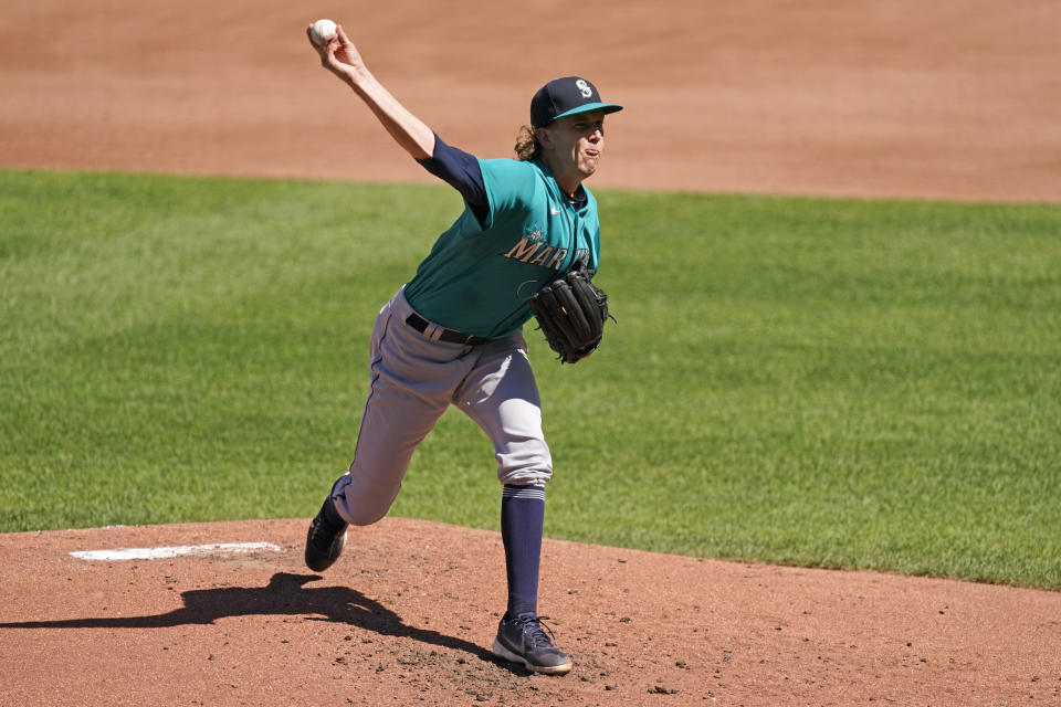 Seattle Mariners starting pitcher Logan Gilbert throws during the second inning of a baseball game against the Kansas City Royals Sunday, Sept. 19, 2021, in Kansas City, Mo. (AP Photo/Charlie Riedel)