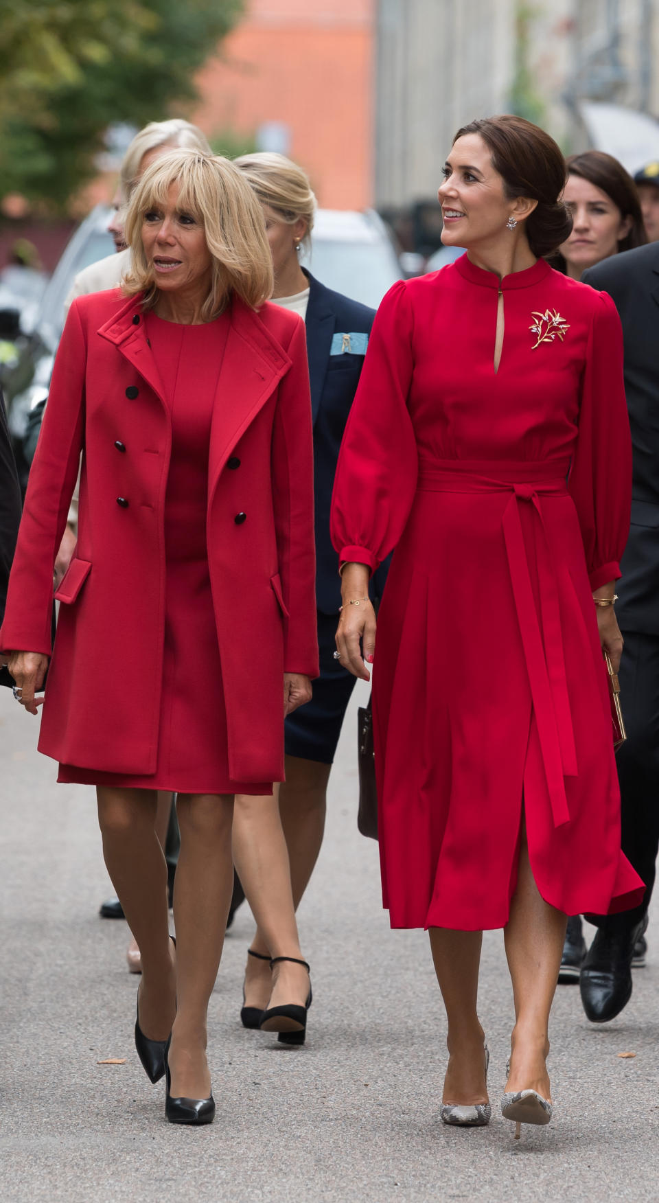 <p>Australian-born Princess Mary, 46, and former school teacher Brigitte, 65, matched in scarlet red when arriving at Amalienborg Castle.<br>Photo: Getty </p>