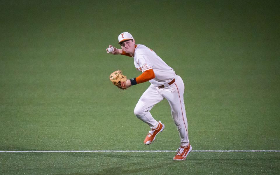 Texas shortstop Jalin Flores throws the ball to first base in the second inning. The Longhorns have lost four straight games heading into this weekend's Big 12 series opener at No. 17 Texas Tech: losses to No. 3 LSU, Texas State, No. 9 Vanderbilt and No. 7 Texas A&M.