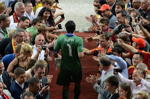 Italian goalkeeper Gianluigi Buffon is congratulated by fans at the end of the Euro 2012 football championships final match Spain vs Italy at the Olympic Stadium in Kiev. Spain won 4-0