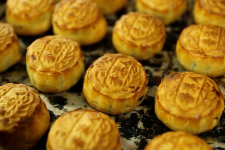 Mooncakes with Chinese words "Hongkonger" are seen at Wah Yee Tang Bakery in Hong Kong