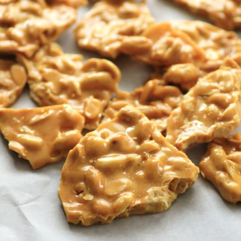<p>Noshing With the Nolands</p><p>Super easy and addictive peanut brittle would make a great gift! </p><p><strong>Get the recipe: <a href="https://noshingwiththenolands.com/peanut-brittle-christmasweek-freund/" rel="nofollow noopener" target="_blank" data-ylk="slk:Peanut Brittle;elm:context_link;itc:0;sec:content-canvas" class="link rapid-noclick-resp">Peanut Brittle</a></strong></p>