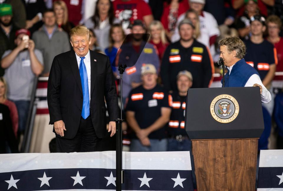 President Donald Trump shared the stage with Senator Rand Paul during the rally on the Eastern Kentucky University campus Saturday night.