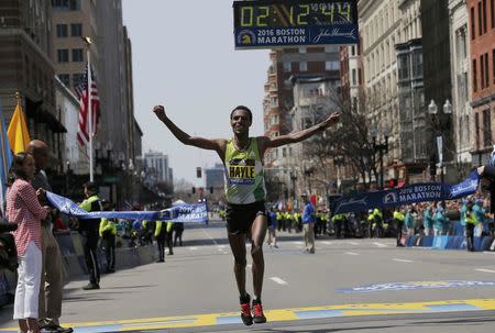 Lemi Berhanu Hayle of Ethiopia crosses the finish line to win the men?s division of the 120th running of the Boston Marathon in Boston, Massachusetts April 18, 2016. REUTERS/Brian Snyder