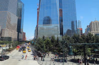 <p>A view of National September 11 Memorial & Museum grounds and One World Trade Center along West Street on Aug. 13, 2017. (Photo: Gordon Donovan/Yahoo News) </p>