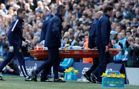 Football - Manchester City v West Ham United - Barclays Premier League - Etihad Stadium - 19/4/15 Manchester City's David Silva is stretchered off after sustaining an injury Reuters / Phil Noble Livepic EDITORIAL USE ONLY.