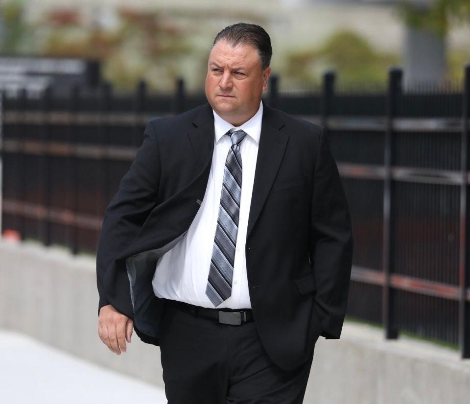 Former Irondequoit Police Chief Alan Laird heads into Federal Court in Rochester on Sept. 12, 2023.