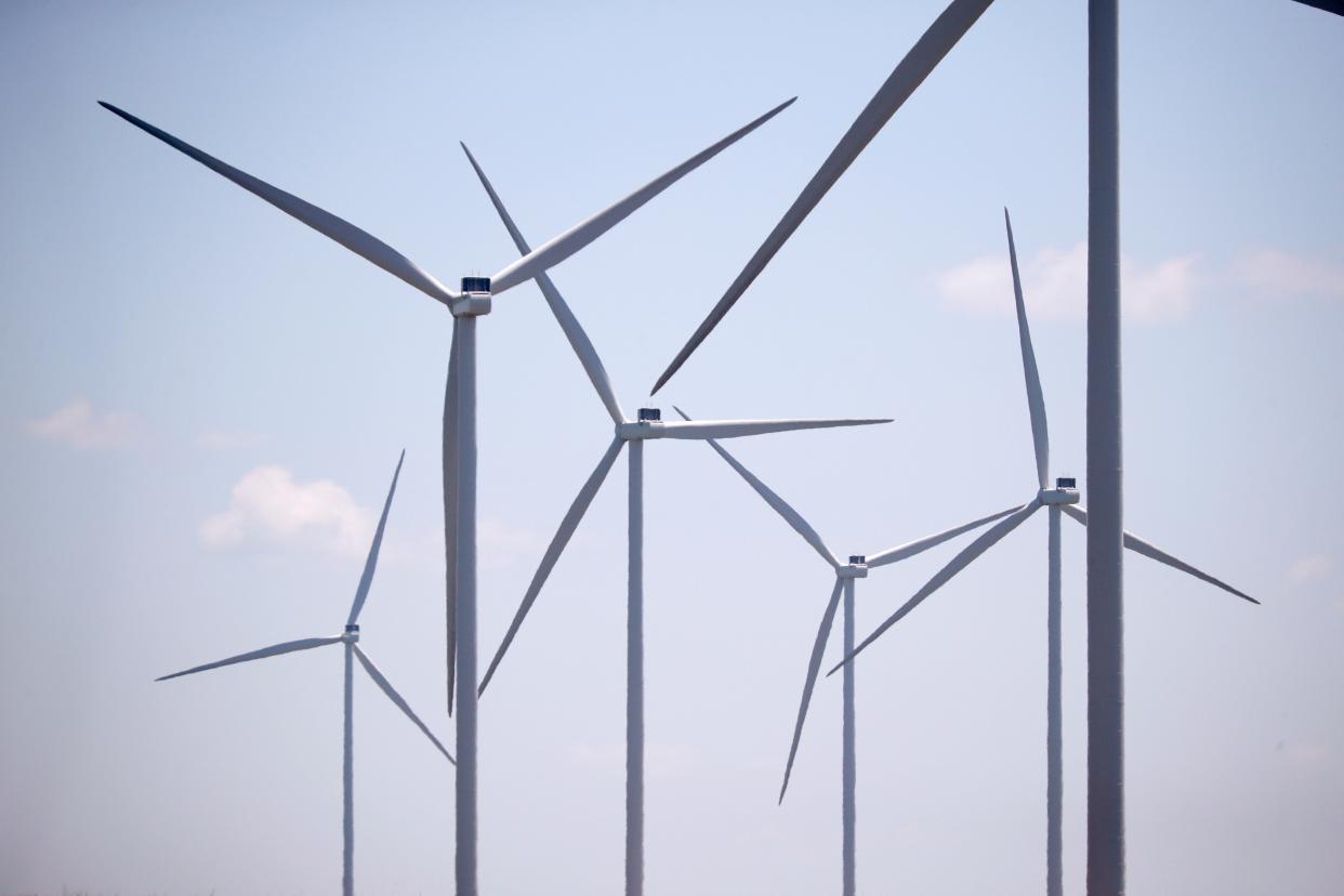 Wind turbines are pictured July 22 outside Sulphur. A Connecticut-based company announced plans this week for a new wind farm in Pontotoc County.