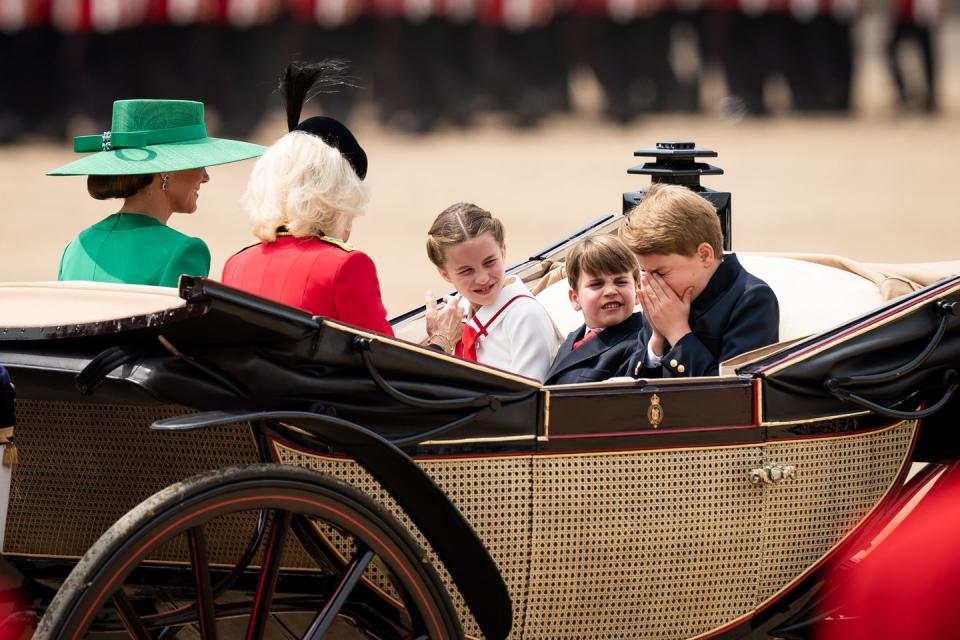 the princess of wales, queen camilla, prince george right, prince louis, the princess of wales left and princess charlotte ride in a carriage as they take part in the royal procession as it returns to buckingham palace after the trooping the colour ceremony at horse guards parade, central london, as king charles iii celebrates his first official birthday since becoming sovereign picture date saturday june 17, 2023 photo by aaron chownpa images via getty images