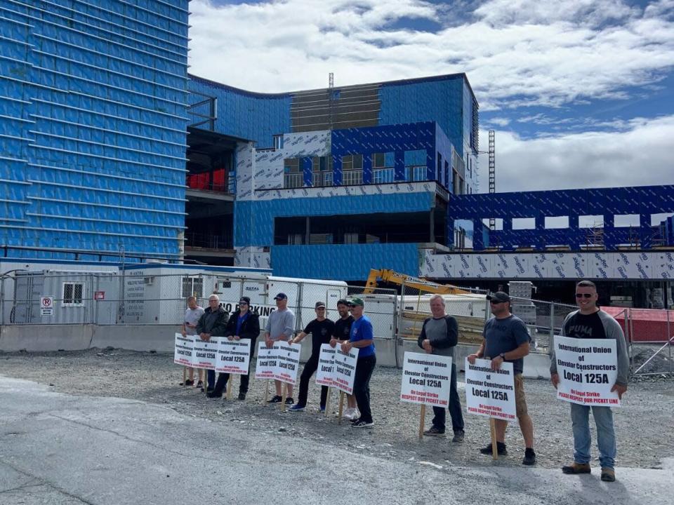 International Union of Elevator Constructors Local 125-A workers picketed Thursday in front of the new mental health facility construction site in St. John's. (Darrell Roberts/CBC - image credit)
