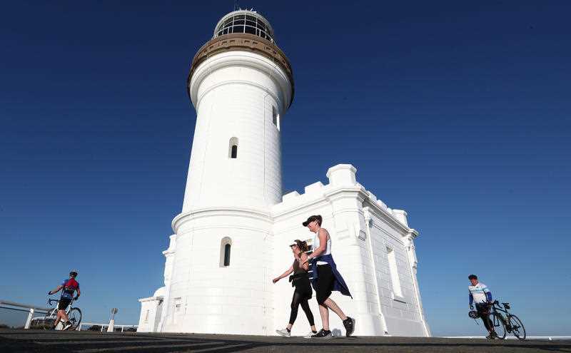 People are seen in Byron Bay, New South Wales.