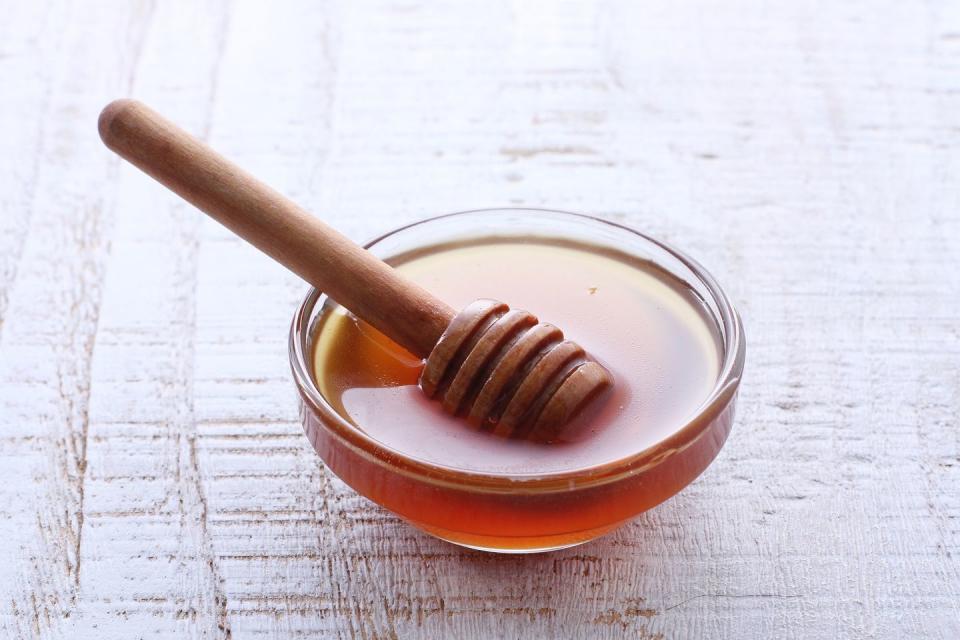 high angle view of honey dipper on table,bekasi,indonesia