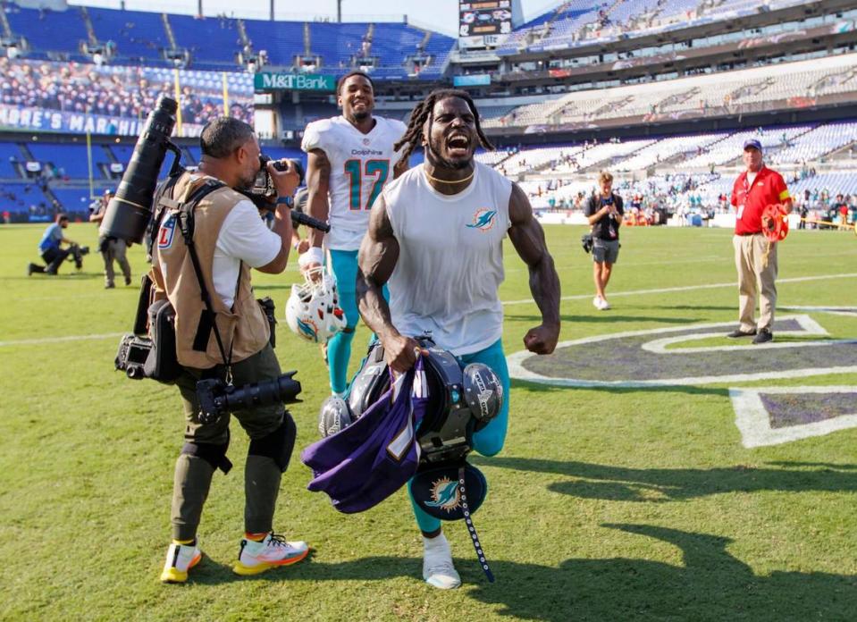 Miami Dolphins wide receiver Tyreek Hill (10) and Miami Dolphins wide receiver Jaylen Waddle (17) runs out the field after their 42-38 win over the Baltimore Ravens during an NFL football game at M&T Bank Stadium on Sunday, September 18, 2022 in Baltimore, MD.