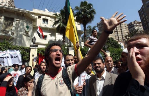 Egyptian protesters take part in a demonstration in front of the Saudi Arabian embassy in Cairo on April 24. Saudi Arabia decided to recall its ambassador to Cairo and close diplomatic missions in Egypt after protests outside its embassy over an arrested Egyptian