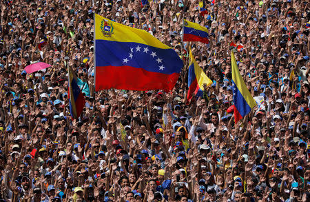 Opposition supporters take part in a rally against Venezuelan President Nicolas Maduro's government in Caracas, Venezuela February 2, 2019. REUTERS/Carlos Barria