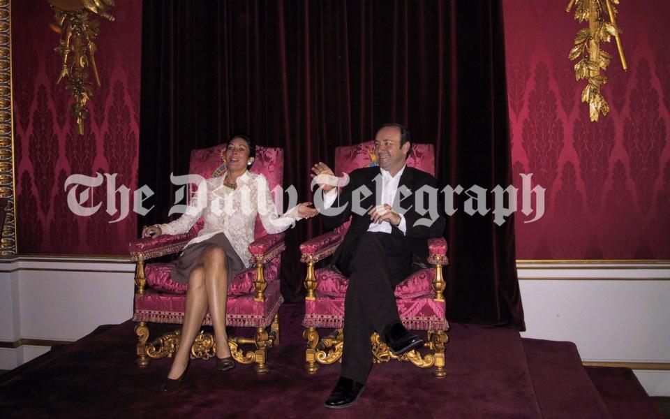 Ghislaine Maxwell and Kevin Spacey sitting on the Queen's thrones - The Telegraph