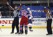 Referees TJ Luxmore and Ian Walsh (29) work the NHL hockey game between the New York Rangers and the Washington Capitals on Wednesday, May 5, 2021, in New York. (Bruce Bennett/Pool Photo via AP)