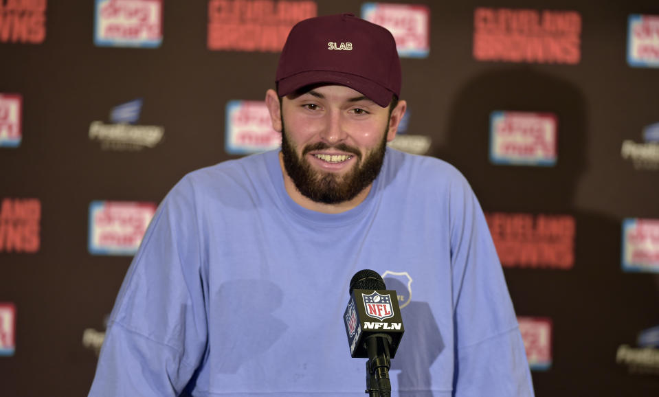 Cleveland Browns quarterback Baker Mayfield smiles as he answers questions during a news conference after an NFL football game, Sunday, Dec. 23, 2018, in Cleveland. The Browns won 26-18. (AP Photo/David Richard)