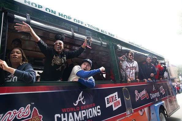 ATLANTA, GA - NOVEMBER 05: Fans cheer for the Atlanta Braves during the World Series Parade at Truist Park on November 5, 2021 in Atlanta, Georgia. The Atlanta Braves won the World Series in six games against the Houston Astros winning their first championship since 1995. (Photo by Megan Varner/Getty Images)