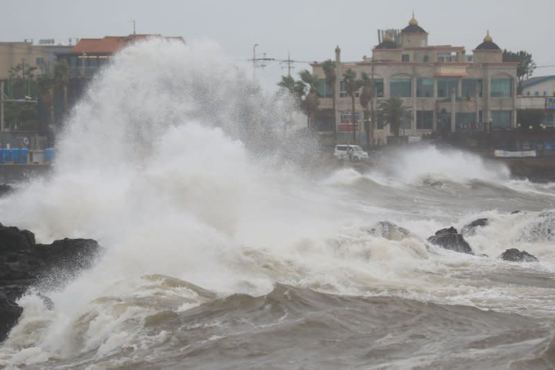 A huge wave caused by approaching Typhoon Chanthu crashes into a breakwater on Jeju Island, South Korea, on September 15, 2021. File Photo courtesy of Yonhap/EPA-EFE