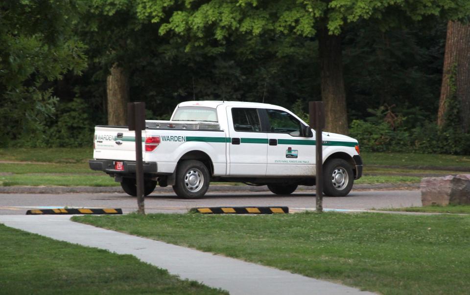 A DNR conservation warden truck on patrol in Devil's Lake State Park in July, 2018.