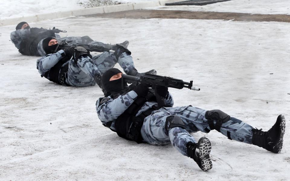Officers with the OMON combat unit train with assault rifles at their base in Podolsk, outside of Moscow, Russia - Contributor#8523328/Getty Images Europe