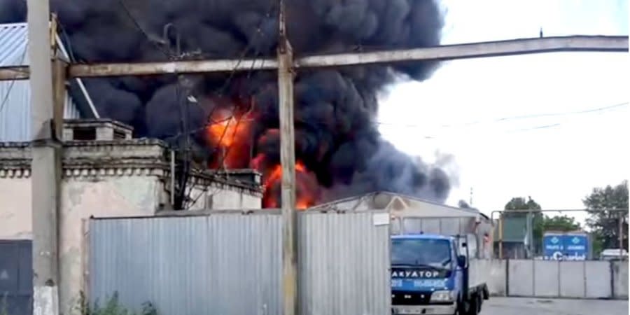 Russian army warehouse  burning in Kherson