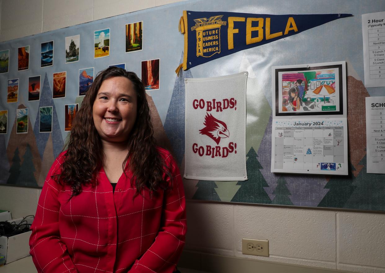 De Pere High School business teacher Kerri Herrild spent years working to have a personal finance curriculum requirement passed at the state level. In December, her efforts were rewarded when Assembly Bill 109 was signed into law.