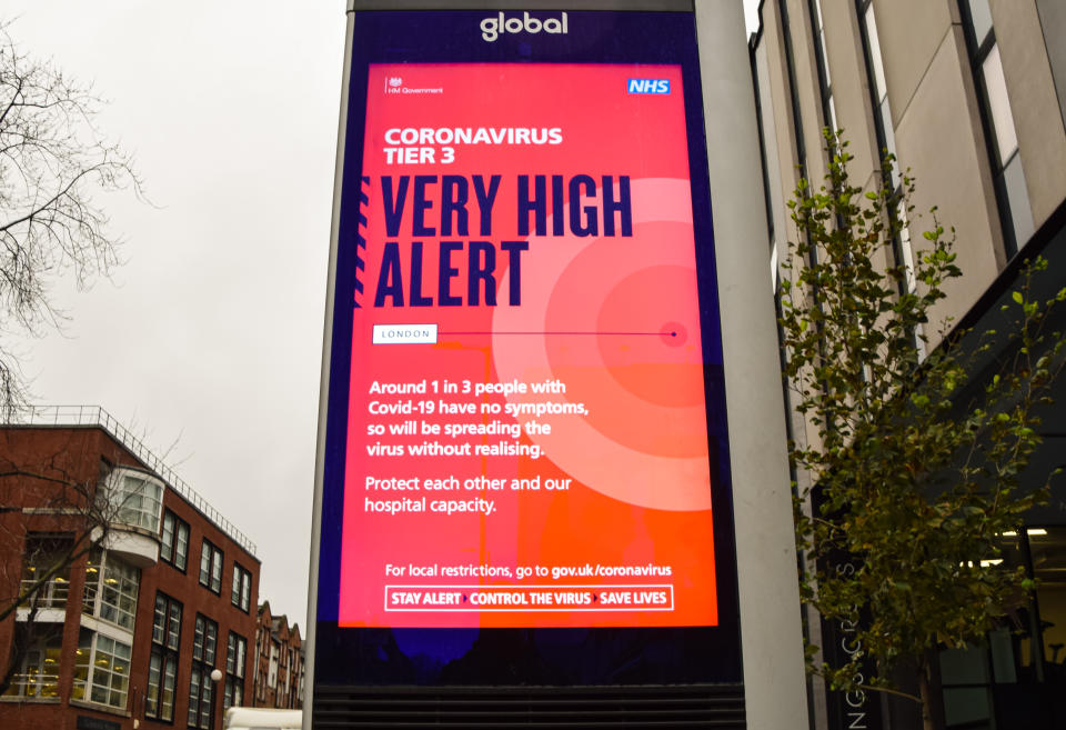 LONDON, UNITED KINGDOM - 2020/12/18: A 'Very High Alert' sign aside the Street in Central London.
The capital has been moved into Tier 3, the highest level of restrictions, as coronavirus cases surge. (Photo by Vuk Valcic/SOPA Images/LightRocket via Getty Images)