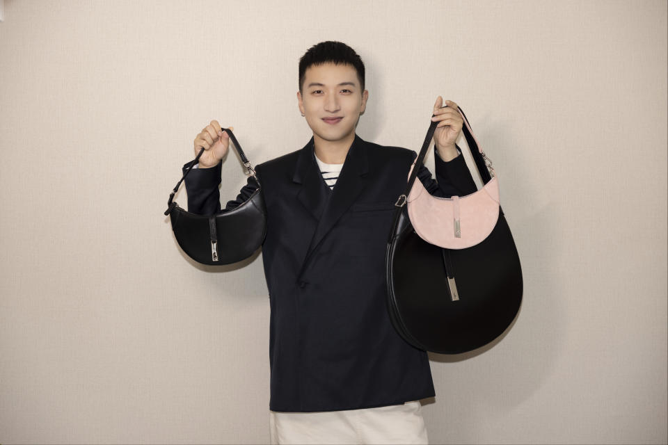 Mr. Bags carrying three styles of the Ralph Lauren Polo ID bag exclusive to China