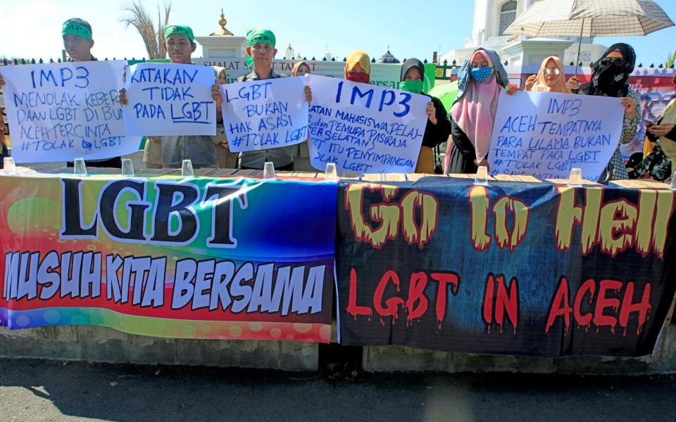 The atmosphere for LGBT people in Indonesia has been growing increasingly hostile, as this protest held earlier this month in Aceh's provincial capital, Banda Aceh, shows  - REUTERS