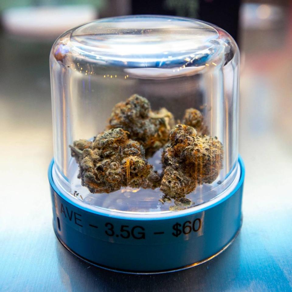 An eighth of ‘Collins Ave’ indoor marijuana strain priced at $60 dollars sits inside a display pod during the grand opening of Cookies Miami. A constitutional amendment would open up the state’s medical marijuana market to all adults older than 21.